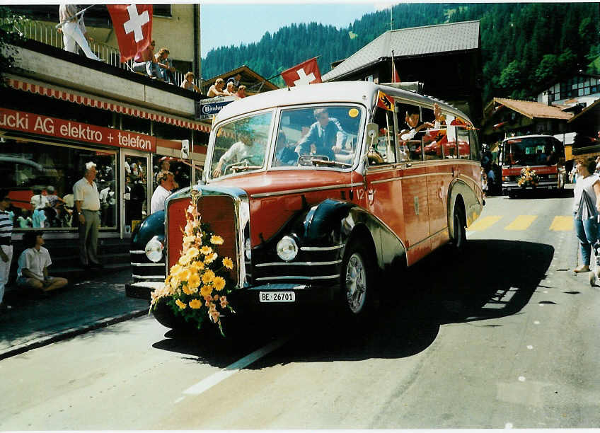 (003'618) - AFA Adelboden - Nr. 12/BE 26'701 - FBW/R&J am 7. August 1988 in Adelboden, Landstrasse (100 Jahre Kur- und Verkehrsverein Adelboden)