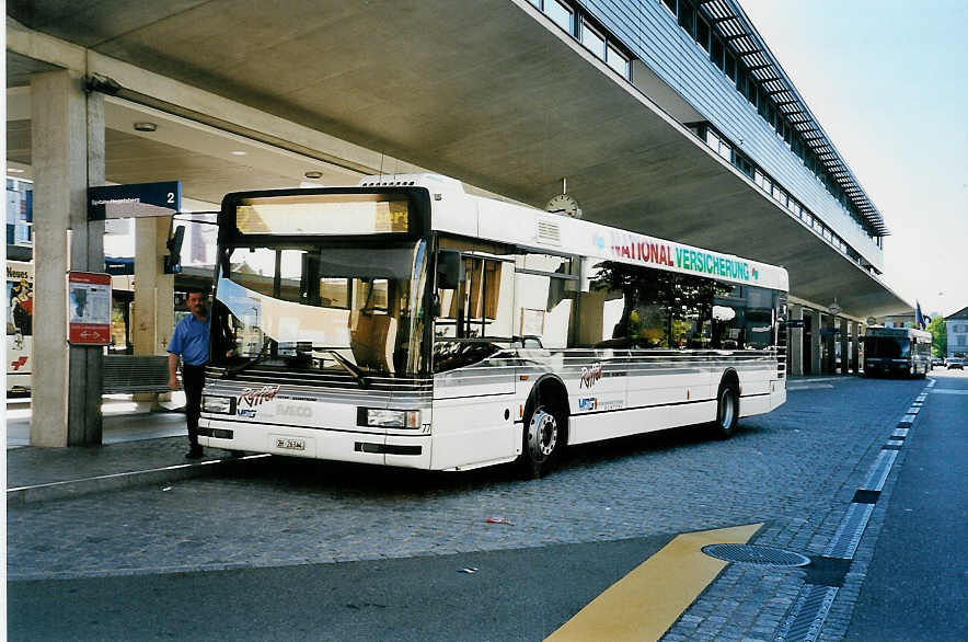 (040'924) - Ryffel, Uster - Nr. 77/ZH 26'344 - Iveco am 18. Juni 2000 beim Bahnhof Uster