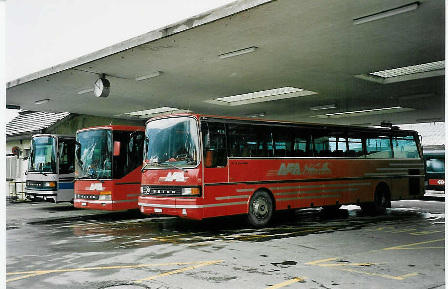 (045'135) - AFA Adelboden - Nr. 12/BE 26'702 - Setra am 24. Februar 2001 beim Bahnhof Frutigen