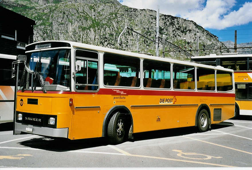 (048'714) - Mattli, Wassen - UR 9104 - Saurer/Tscher am 23. Juli 2001 beim Bahnhof Andermatt