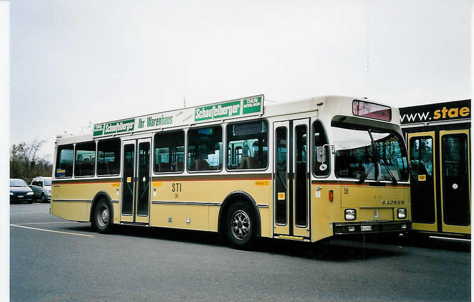 (052'130) - STI Thun - Nr. 58/BE 413'458 - Saurer/R&J am 20. Februar 2002 in Thun, Garage