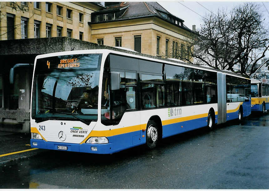 (057'403) - TC La Chaux-de-Fonds - Nr. 243/NE 109'243 - Mercedes am 30. November 2002 beim Bahnhof La Chaux-de-Fonds