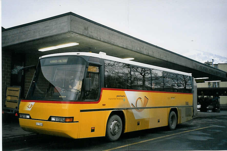 (065'107) - Schett, Sargans - SG 11'549 - Neoplan am 1. Januar 2004 beim Bahnhof Sargans