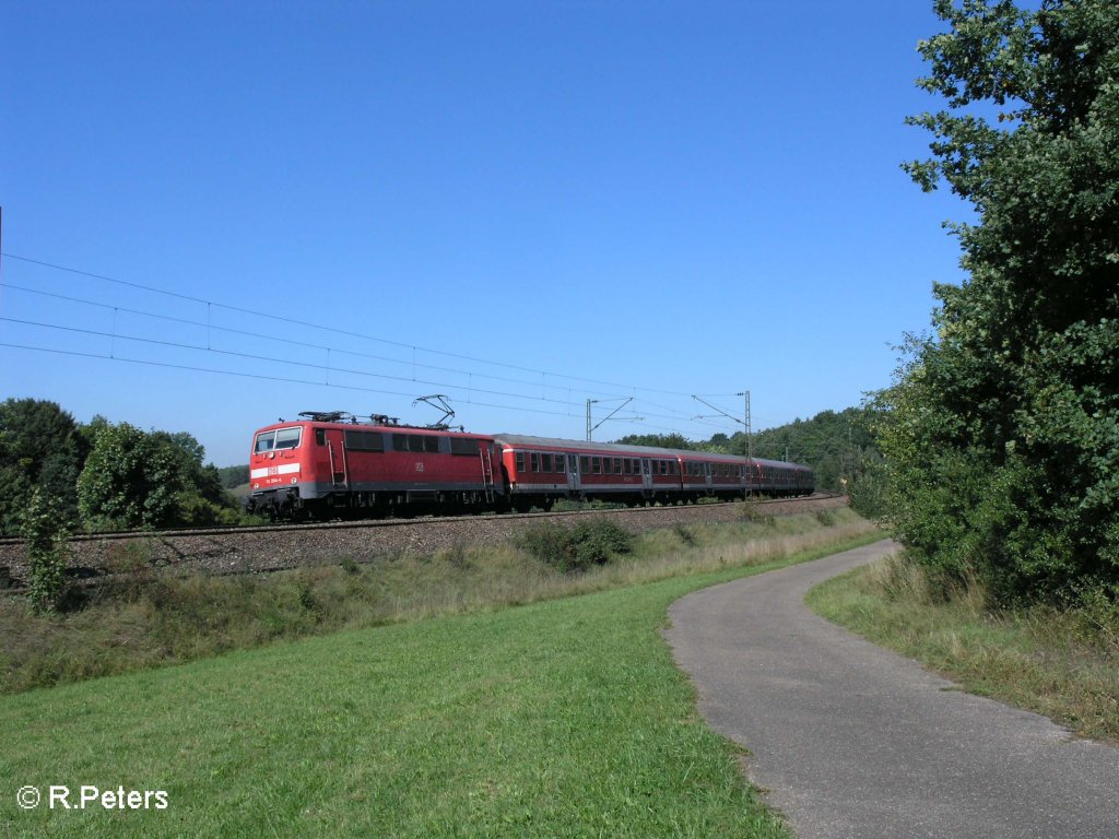 111 204-4 zieht bei Edlhausen eine RB Plattling durch die Kurve bei Edlhausen. 09.09.08