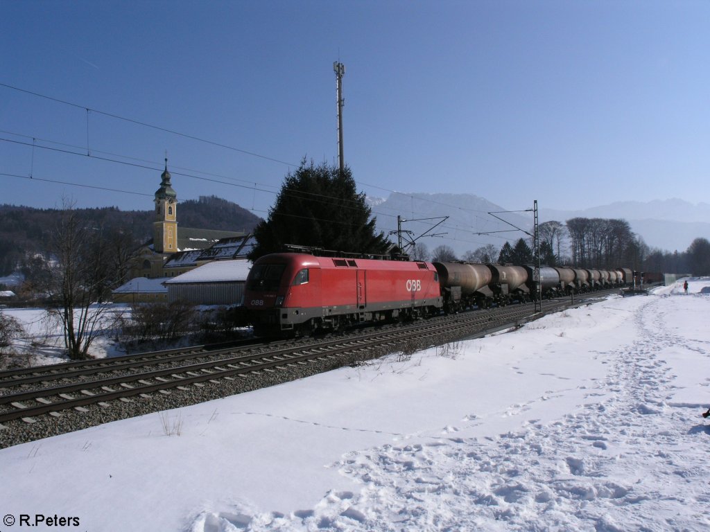 1116 280-7 zieht einen gemischten Gterzug nach Deutschland bei Niederaudorf. 16.02.10