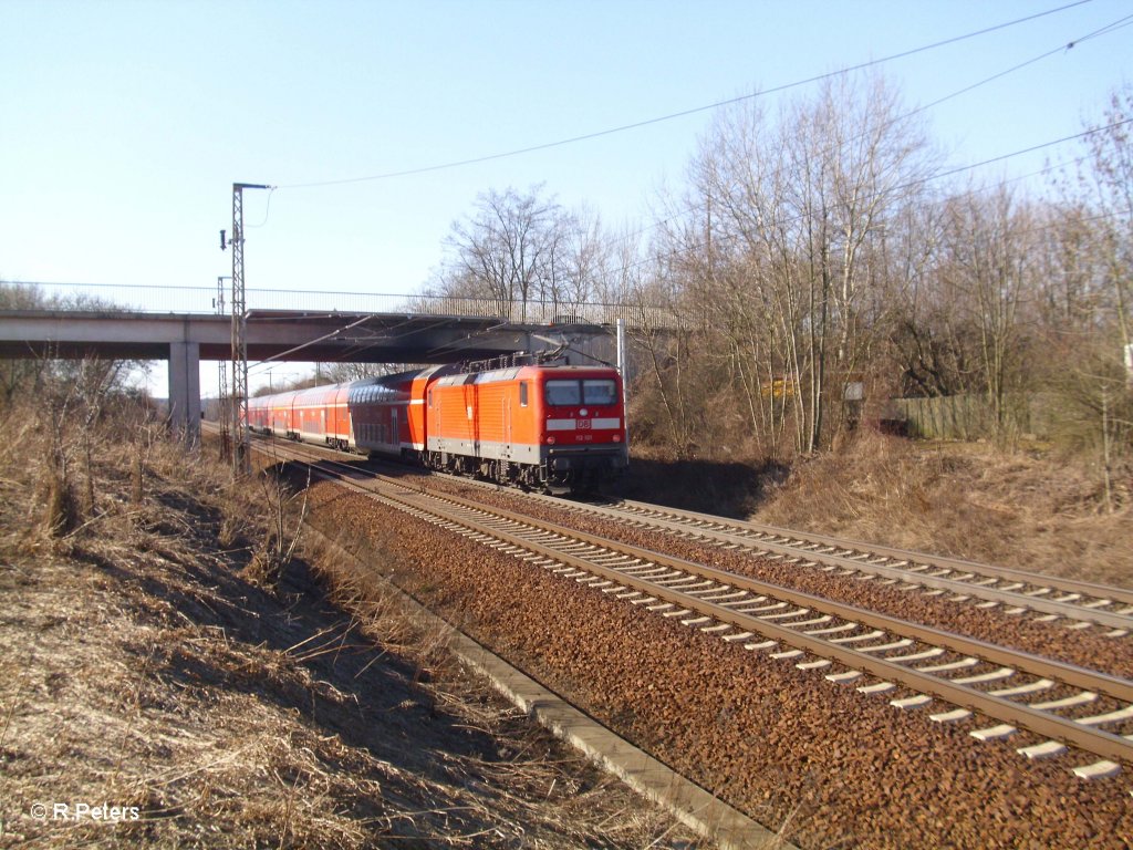 112 101 schiebt bei Frankfurt/Oder Nuhnen den RE1 Magdeburg. 07.03.11