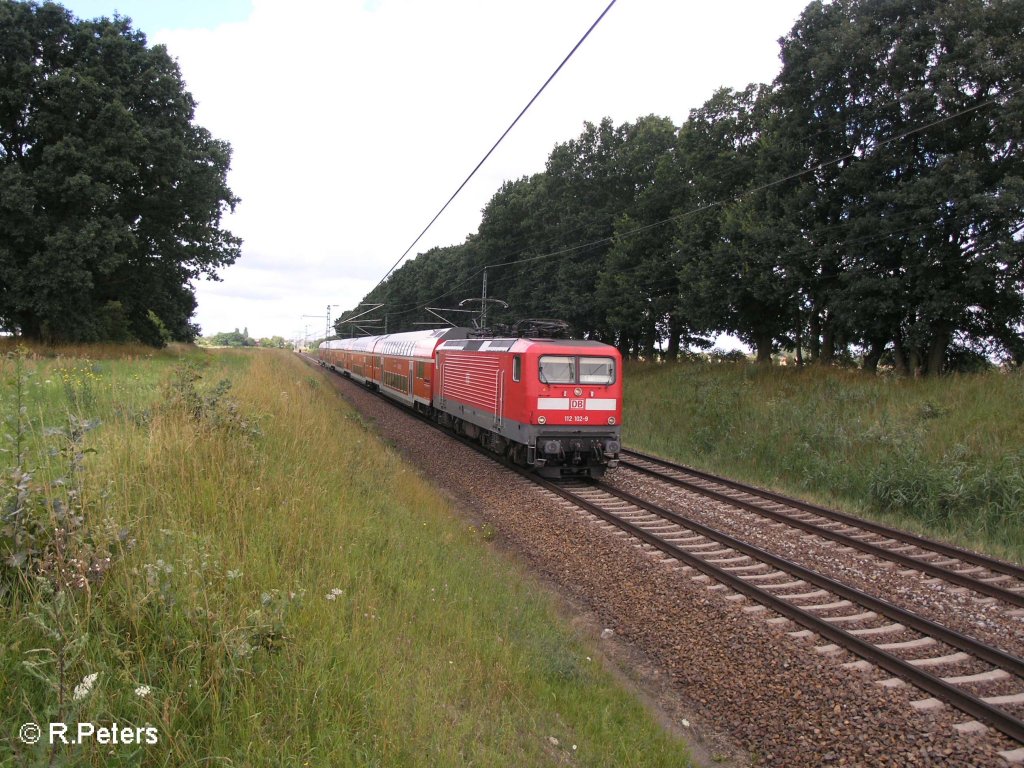 112 102-9 zieht bei Jacobsdorf(Markt) den RE1 Frankfurt/Oder. 17.07.08