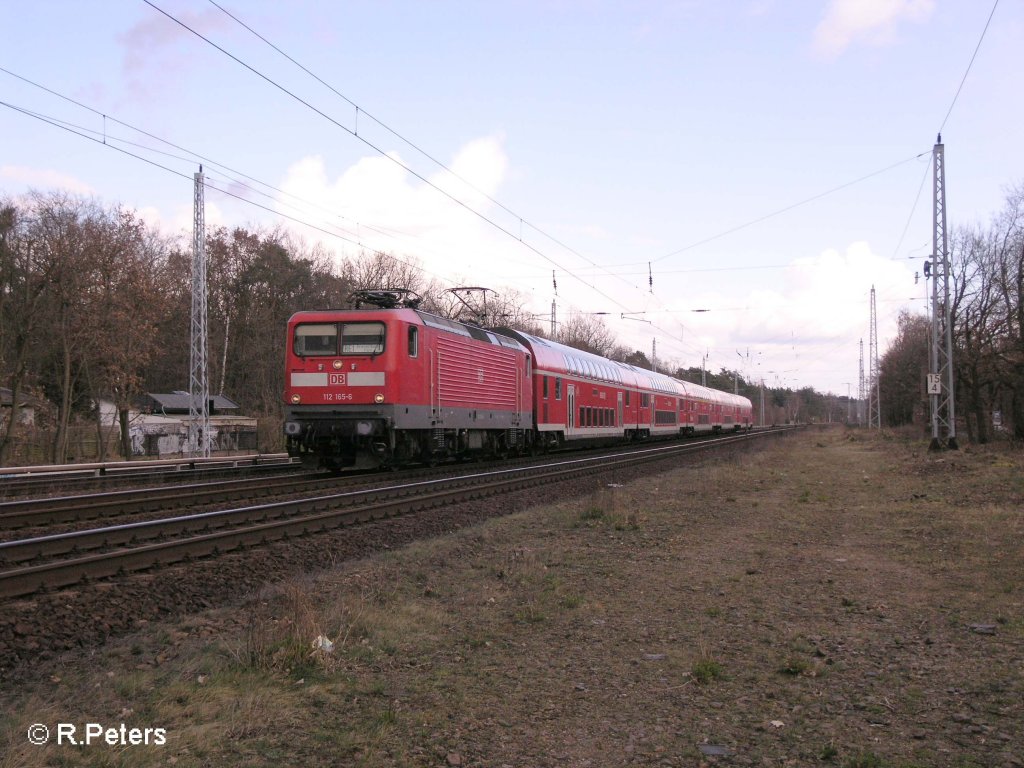 112 165-6 auf den Rckweg mit RE1 Brandenburg HBF bei Berlin-Friedrichshagen. 19.03.08