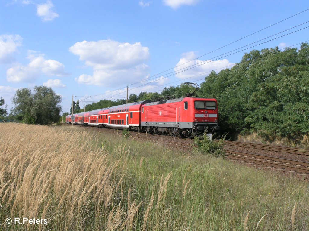 112 189-6 schiebt kurz hinter eisenhttenstatd ein RE1 nach magdeburg. 21.08.08