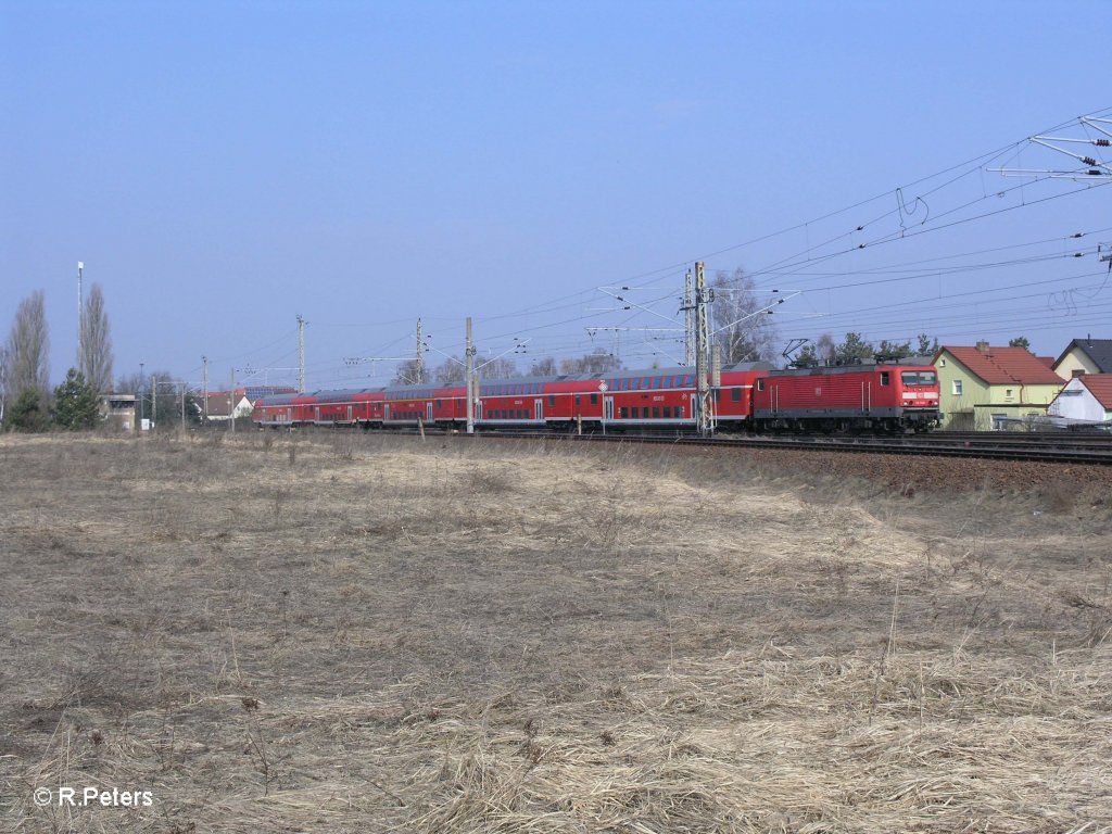 114 020 zieht RE1 nach Eisenhttenstadt bei Wiesenau. 09.03.11