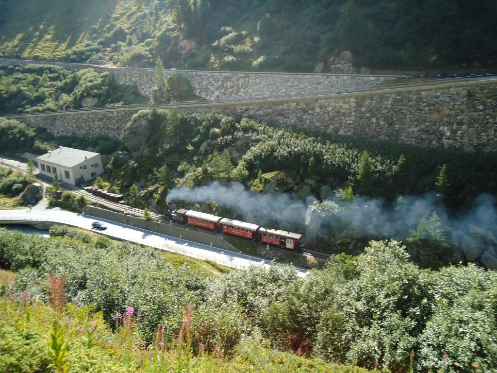 (135'686) - Die Furka Dampfbahn am 21. August 2011 bei Gletsch