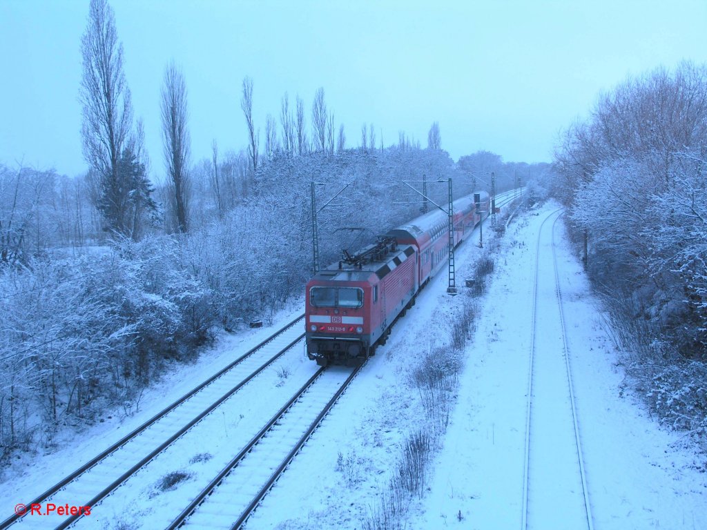 143 212-9 verlsst Schkeuditz als S10 Halle. 23.12.09