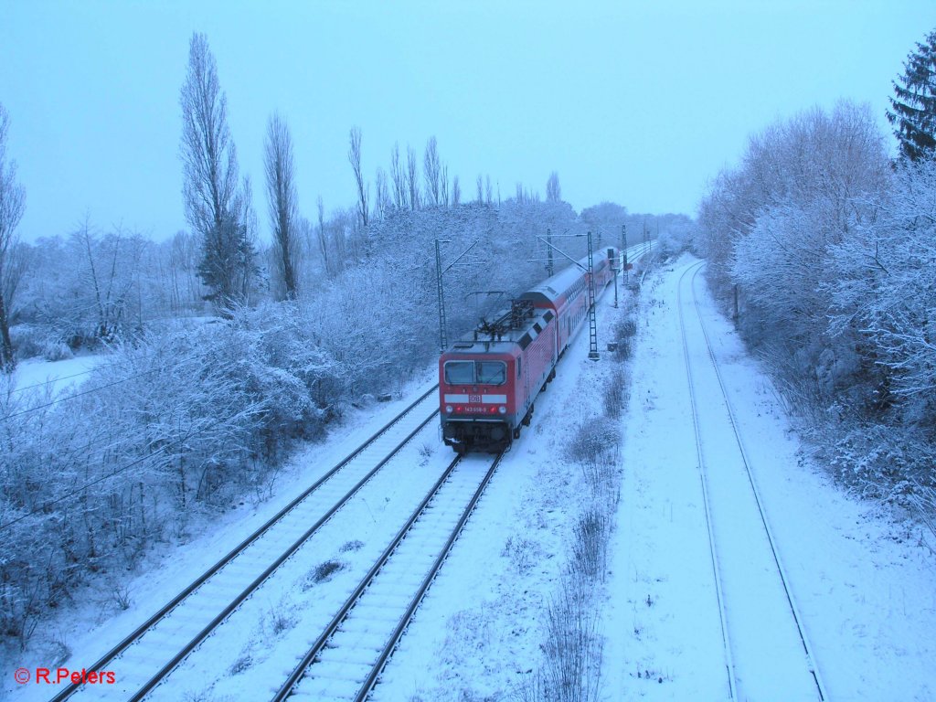 143 658-3 verlsst Schkeuditz in Richtung Halle. 23.12.09