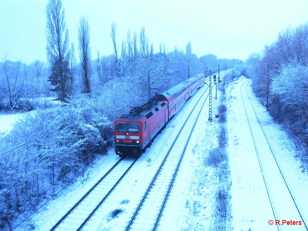 143 844-9 fhrt als S10 Leipzig HBf in Schkeuditz ein. 23.12.09