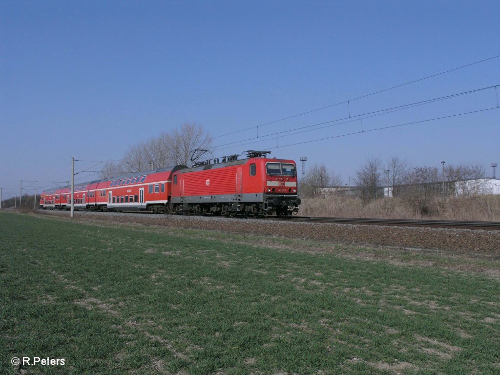 143 928 zieht die RB26139 Lutherstadt Wittenberg - Leipzig bei Podelwitz. 29.03.11