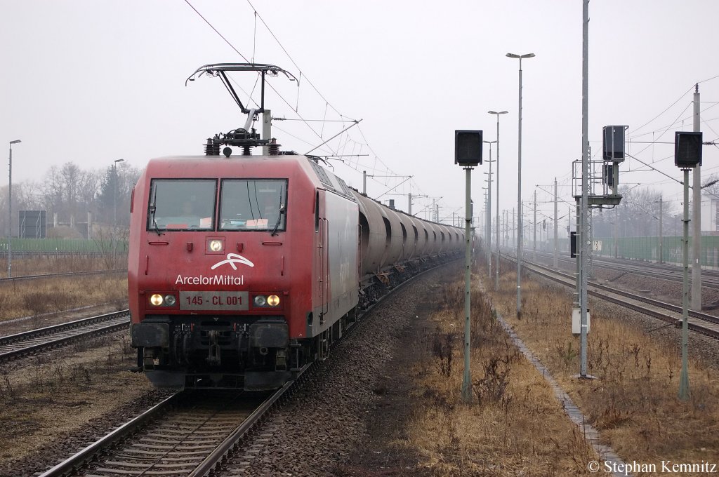 145 - CL 001 (145 081-6) von der Arcelor-Mittal mit Steinkohlenstaub Kesselzug in Rathenow in Richtung Wustermark unterwegs. 14.03.2011