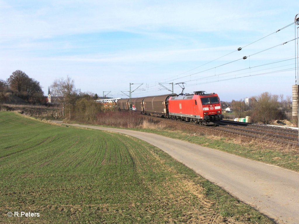 185 006-7 mit gemischten Gterzug bei Fahlenbach. 24.03.11