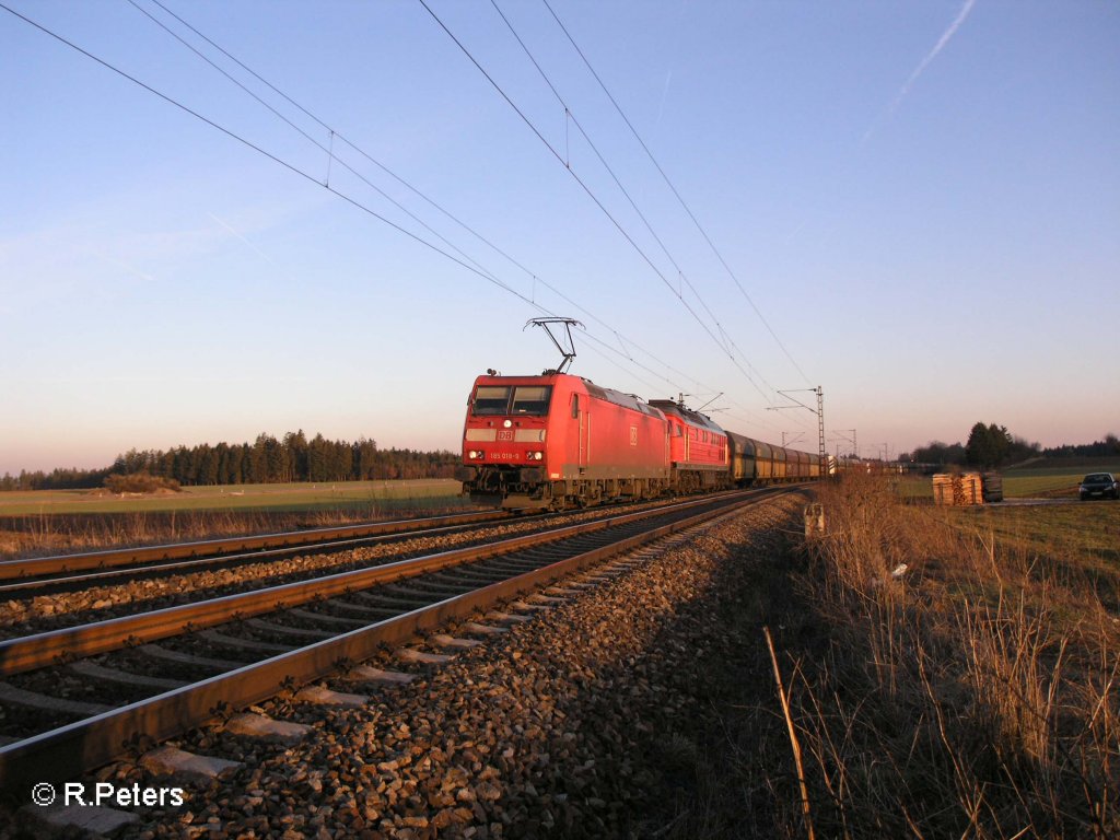 185 018-9 gibt vorspannhilfe vor einer 233 und ihre Polenkohle bei Batzhausen. 06.03.08