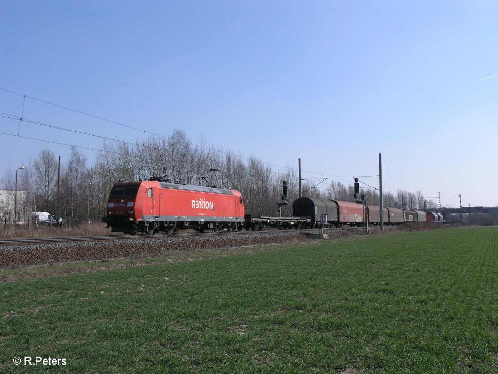 185 156-7 mit gemischten Gterzug bei Podelwitz. 29.03.11