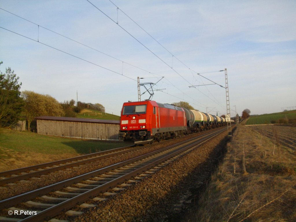 185 391-0 zieht ein Kesselzug bei Fahlenbach. 24.03.11