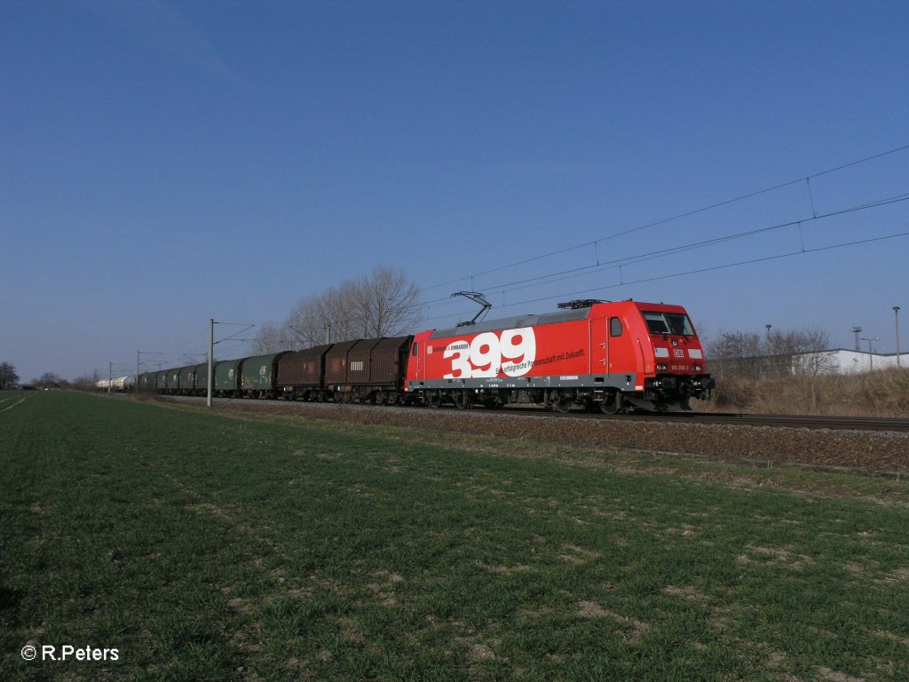 185 399-3 mit gemischten Gterzug bei Podelwitz. 29.03.11