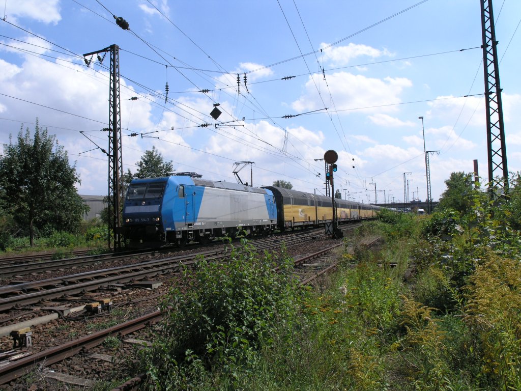 185 514-7 verlsst Regensburg Ost mit ein Autozug in Richtung HBF. 27.08.09