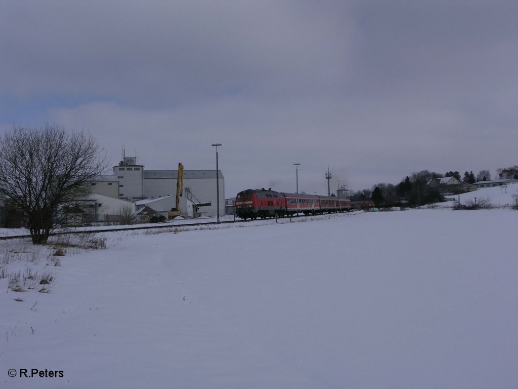 218 345-7 verlsst Buchloe mit ein RE nach Memmingen. 25.02.09
