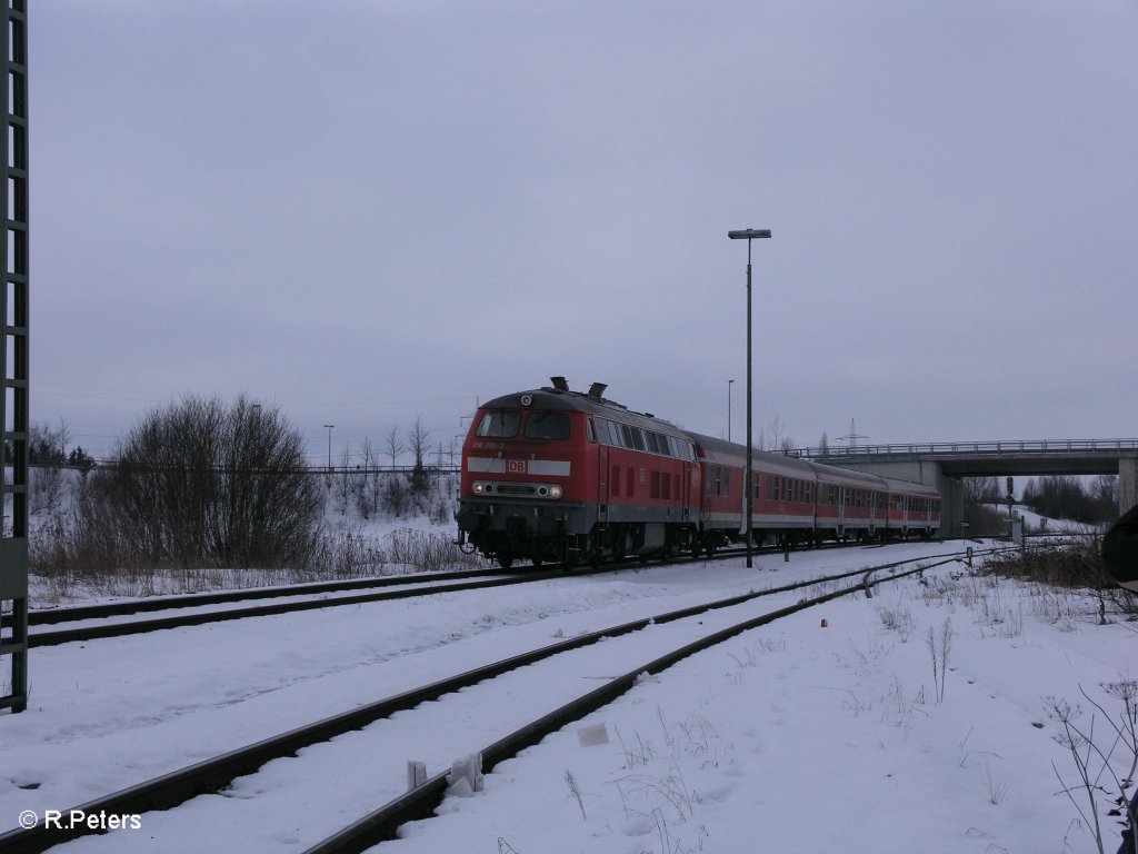 218 390-3 fhrt in Buchloe mit einer RB Mnchen ein. 25.02.09