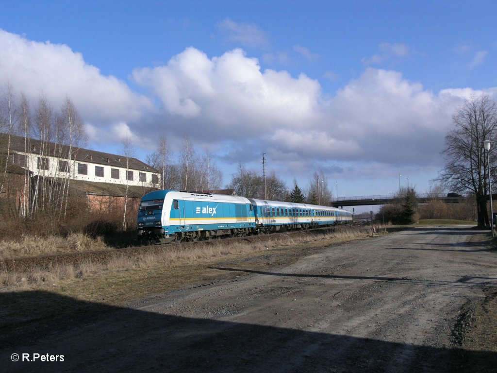 223 064 zieht den ALX37977 nach Mnchen durch die Wiesauer Kurve. 20.03.09
