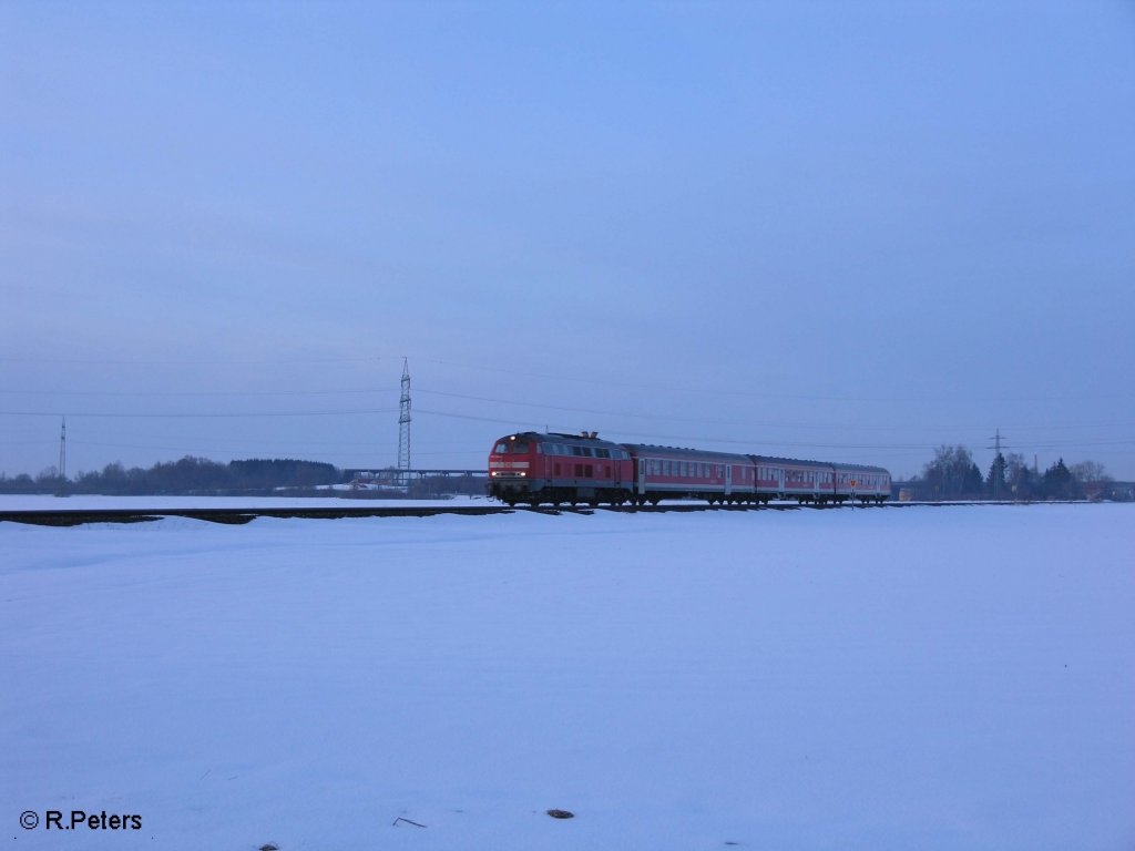 Eine 218er lsst Buchloe hintersich in Richtung Kempten. 25.02.08