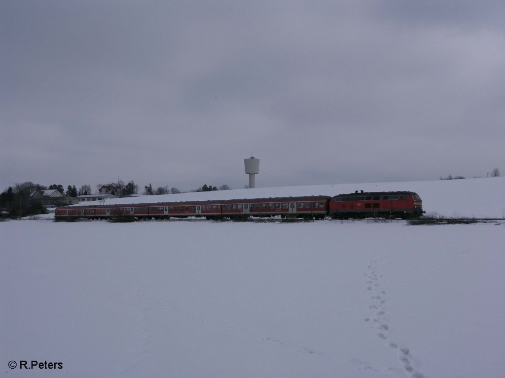 Eine Unbekannte 218 verlsst Buchloe mit einer RB nach Kempten. 25.02.09