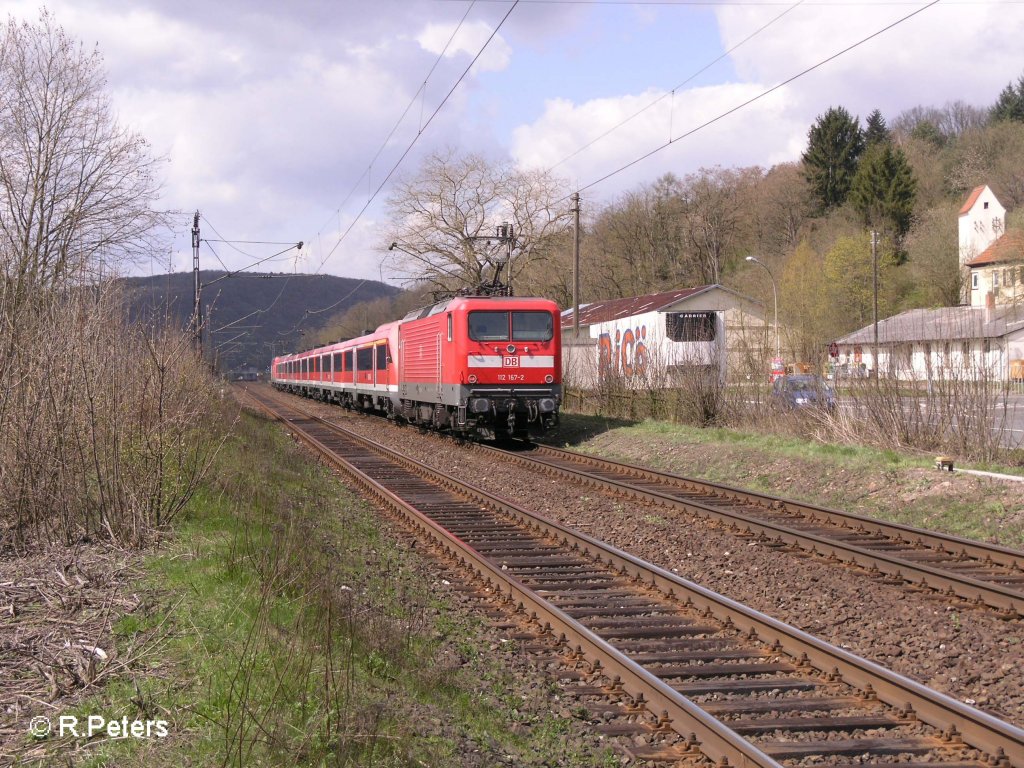 Nachschuss von den RE mit 112 167-2 bei Gambach. 12.04.08