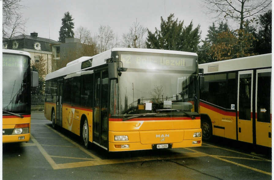 (082'130) - Geissmann, Hgglingen - AG 14'886 - MAN am 27. Dezember 2005 beim Bahnhof Wohlen