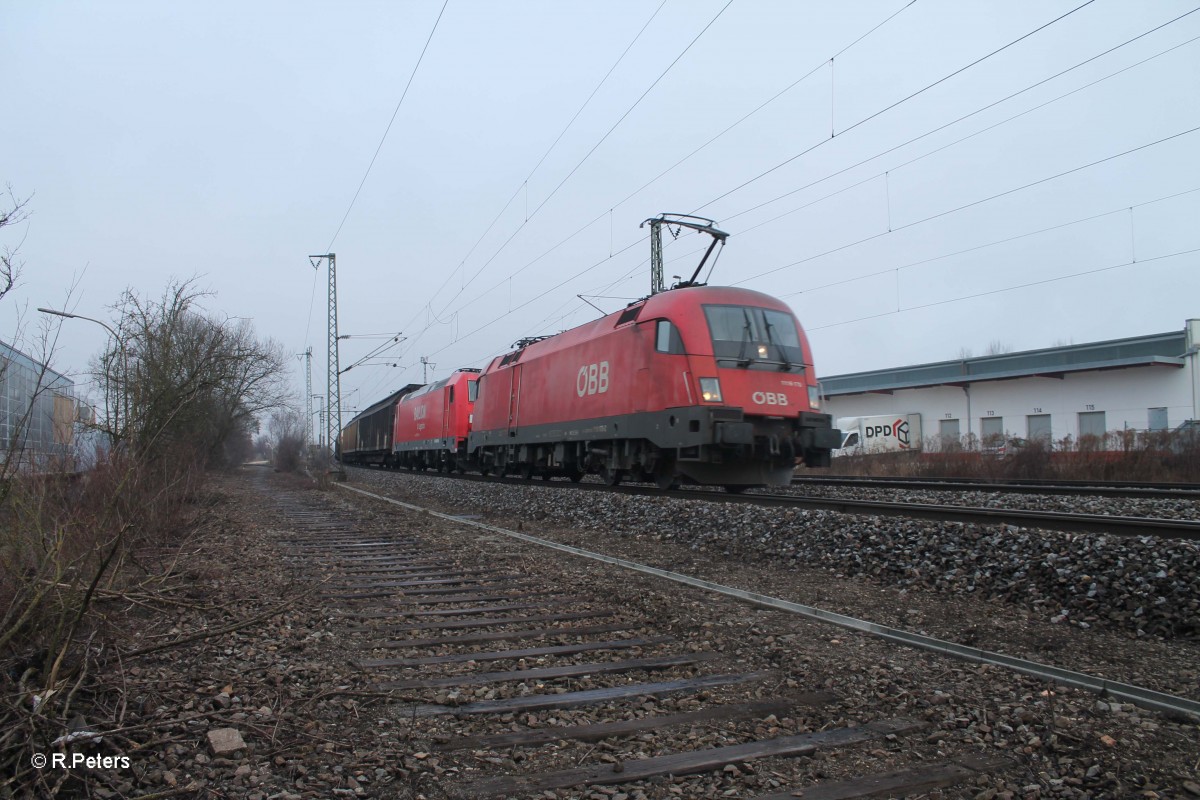 1116 170-2 mit einer 185iger und gemischten Güterzug in Obertraubling. 20.02.14