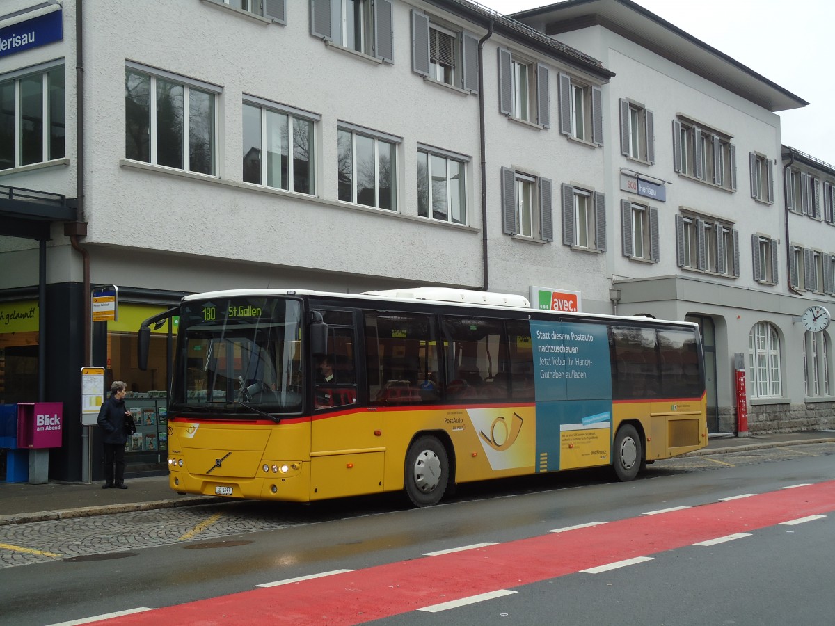 (132'299) - Casutt, Gossau - SG 4693 - Volvo am 12. Januar 2011 beim Bahnhof Herisau