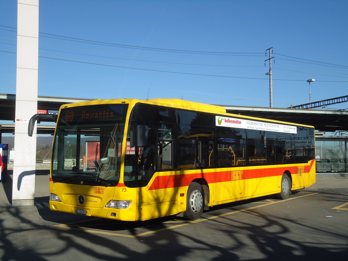 (132'568) - BLT Oberwil - Nr. 73/BL 153'268 - Mercedes am 7. Februar 2011 beim Bahnhof Muttenz