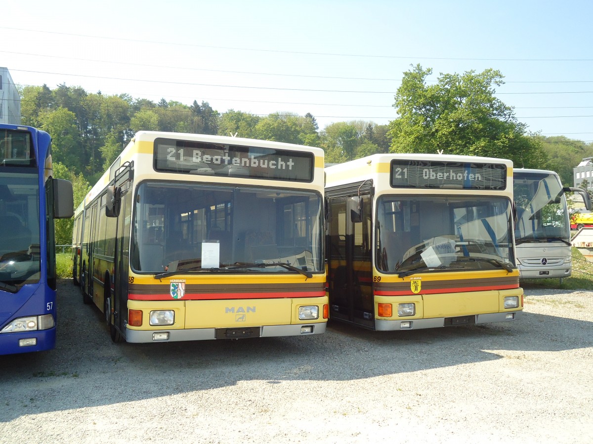 (133'421) - STI Thun - Nr. 68 + Nr. 69 - MAN am 25. April 2011 in Kloten, EvoBus