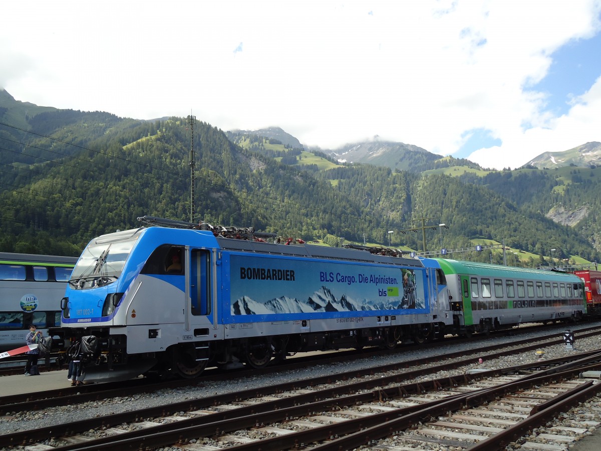 (145'574) - Bombardier-Lokomotive - Nr. 187'002-1 - am 30. Juni 2013 in Frutigen (100 Jahre BLS)