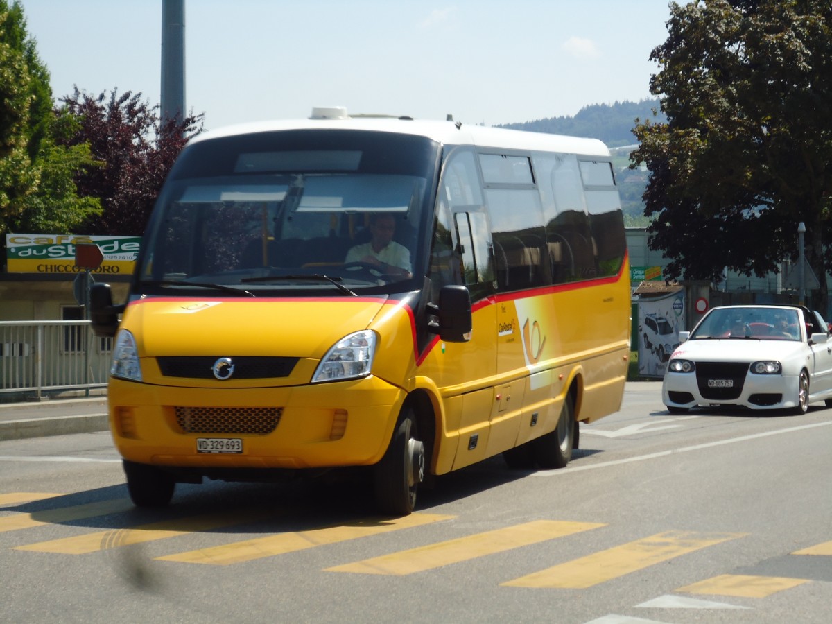 (146'028) - CarPostal Ouest - VD 329'693 - Irisbus/Rosero am 22. Juli 2013 in Yverdon, Garage