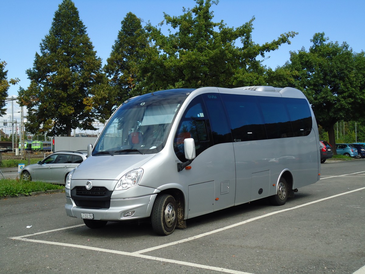 (147'097) - Bushandel, Dagmersellen - LU 202'392 - Irisbus/UNVI am 13. September 2013 in Thun, Seestrasse