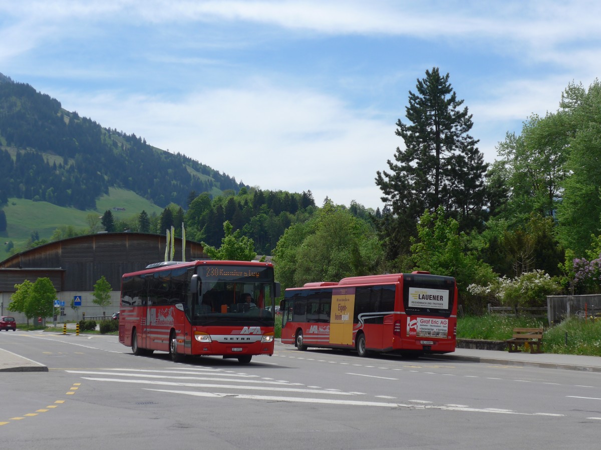 (160'486) - AFA Adelboden - Nr. 24/BE 26'701 - Setra + Nr. 28/BE 43'089 - Mercedes am 14. Mai 2015 beim Bahnhof Frutigen