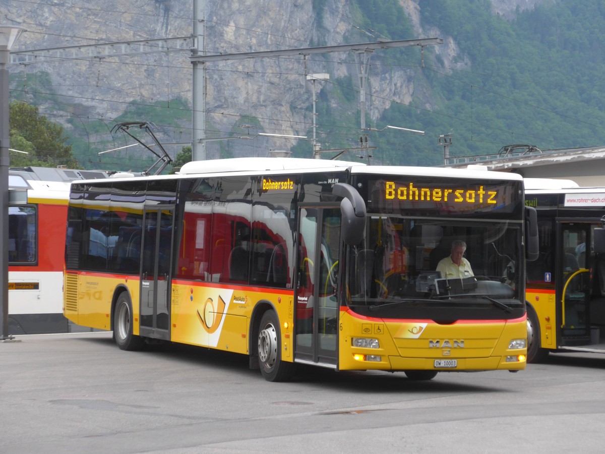 (162'012) - Dillier, Sarnen - Nr. 6/OW 10'003 - MAN am 8. Juni 2015 beim Bahnhof Meiringen