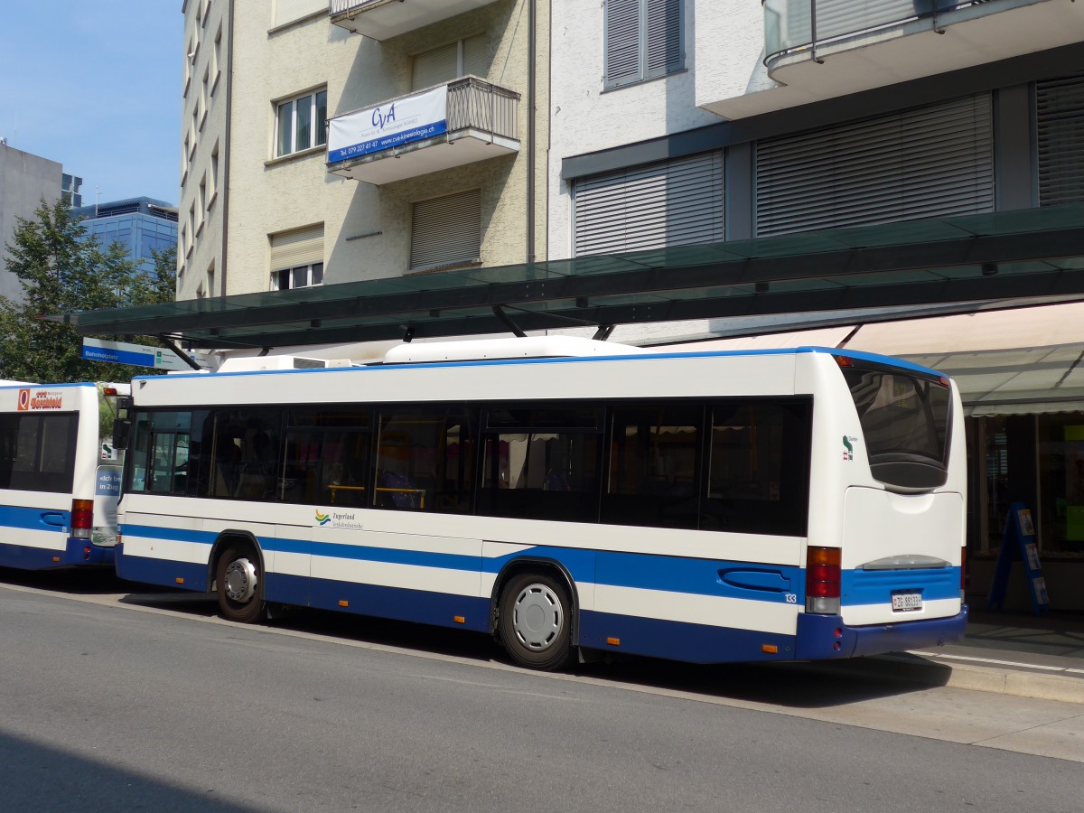 (162'976) - ZVB Zug - Nr. 133/ZG 88'133 - Scania/Hess am 6. Juli 2015 beim Bahnhof Zug