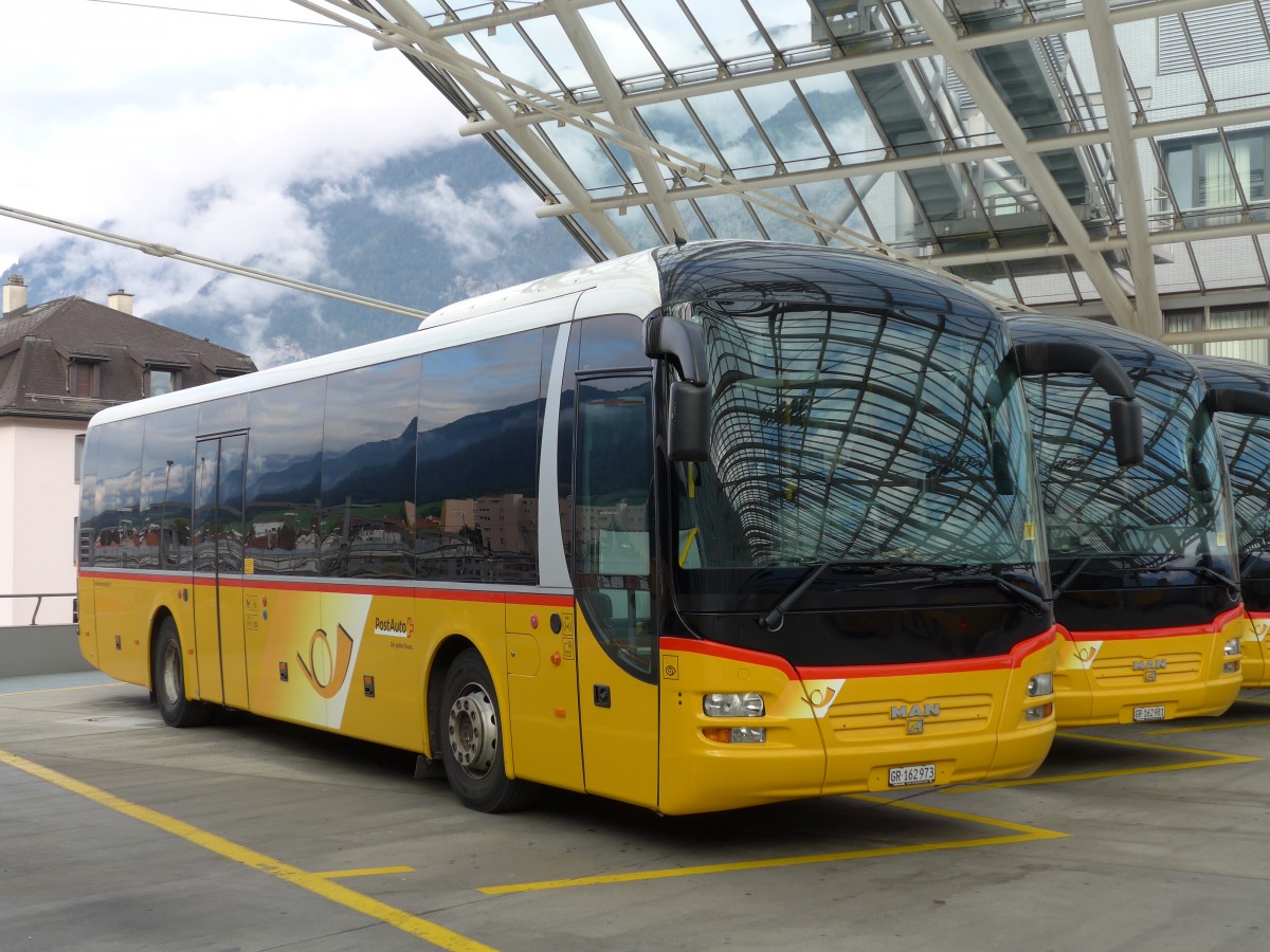 (165'191) - PostAuto Graubnden - GR 162'973 - MAN am 19. September 2015 in Chur, Postautostation