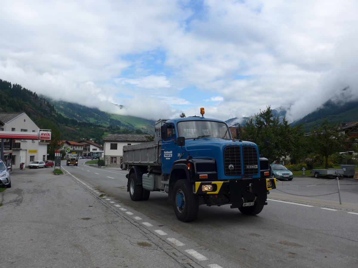 (165'271) - Frischknecht, Herisau - Nr. 35/AR 128 U - Saurer am 19. September 2015 in Andeer, Tgavugl
