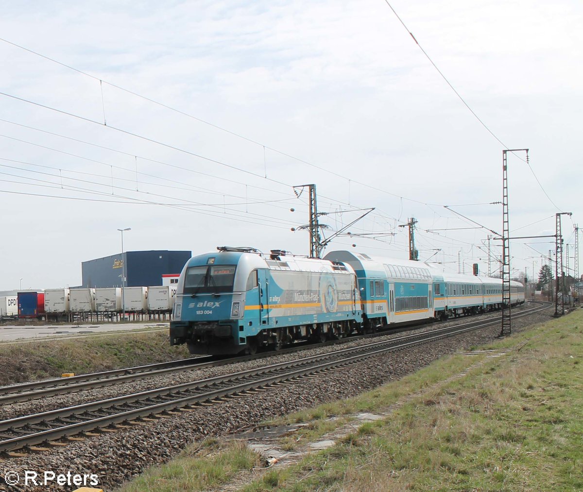 183 004 zieht bei Obertraubling den ALX 79857 München - Hof. 14.03.20