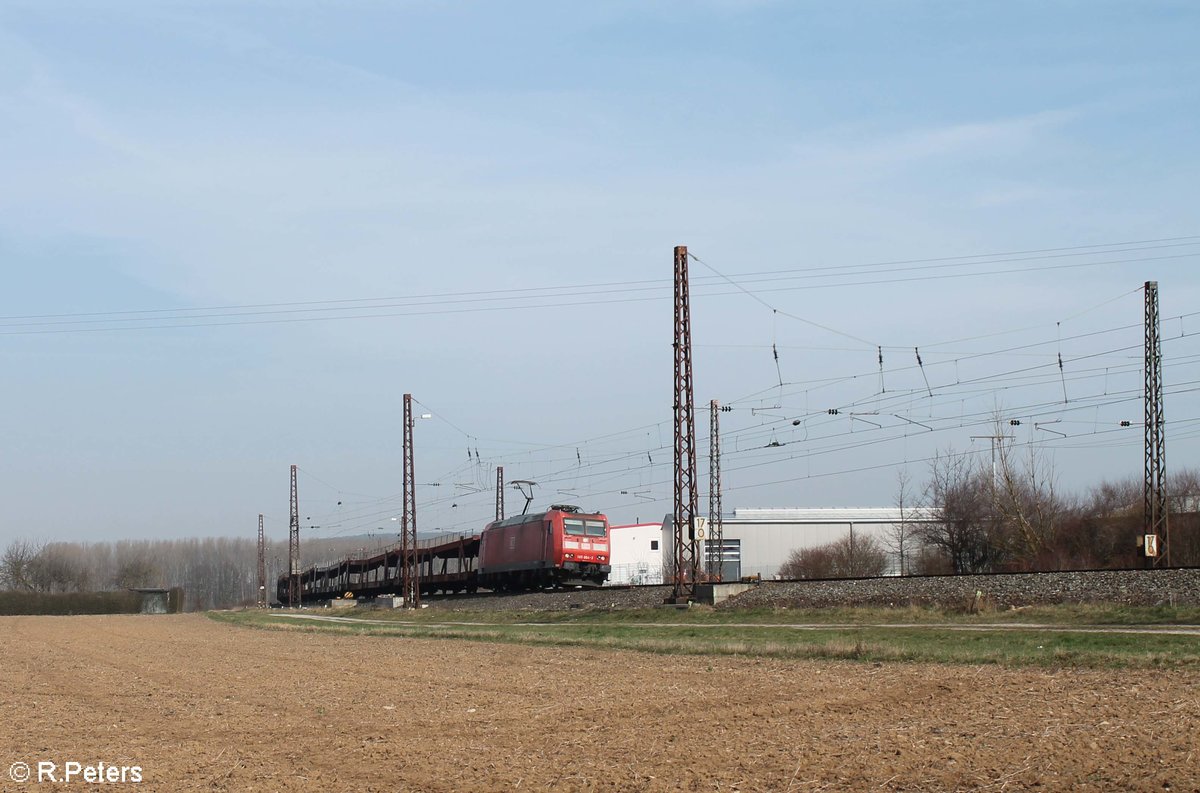 185 064-3 zieht bei Retzbach-Zellingen ein leeren Autotransportzug in Richtung Würzburg. 16.03.17