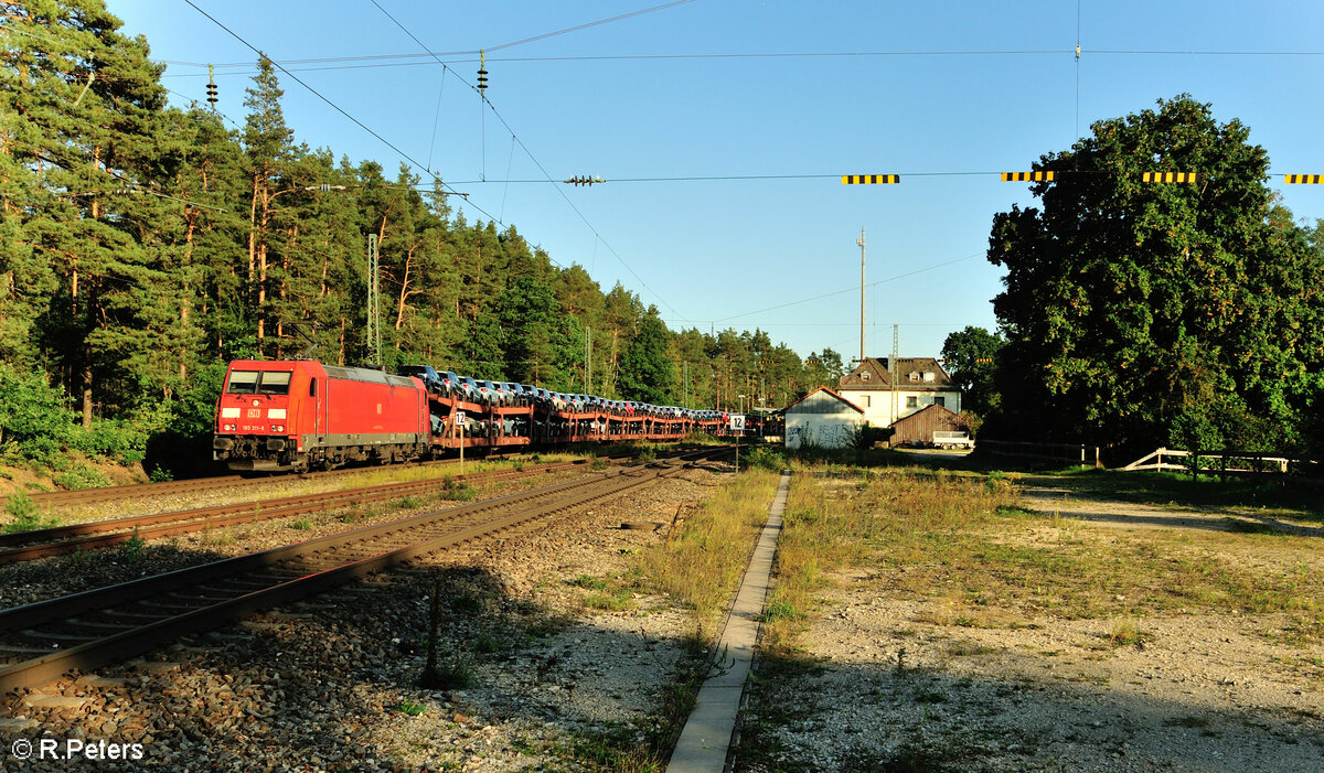 185 311-8 mit einem Autotransportzug in Ochenbruck. 15.09.23