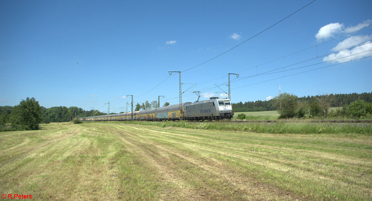 185 539-4 zieht bei Oberdachstetten mit einem ARS Altmann Zug in Richtung Sden. 08.06.24