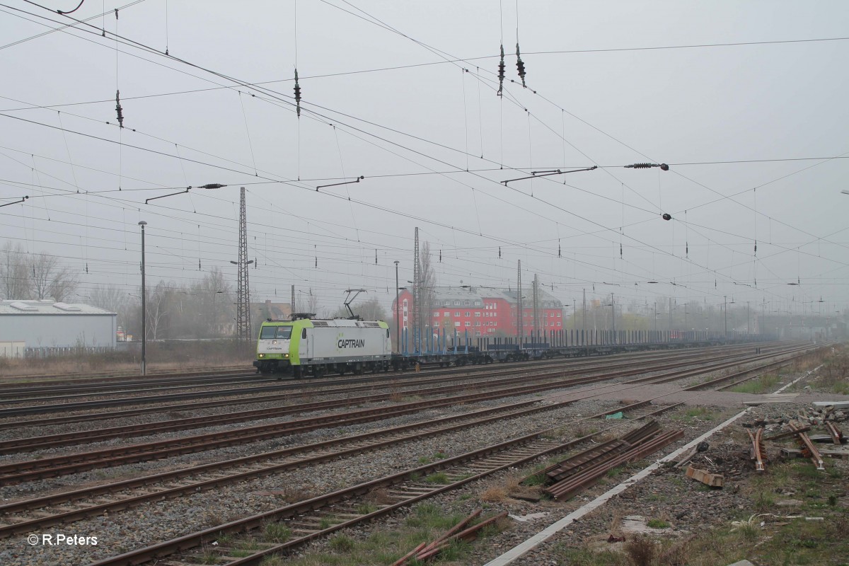 185 CL007 alias 185 507-1 Sir Rainer mit einem Stahlzug in Leipzig Schönefeld. 29.03.14